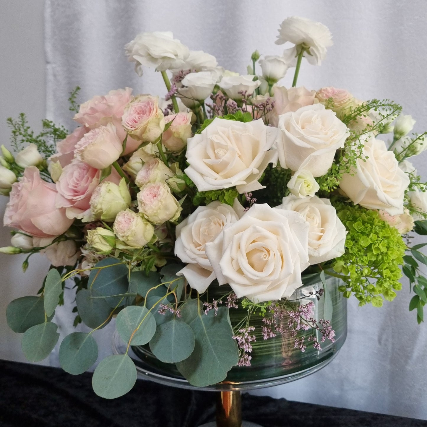 Ivory Meadow Floral Arrangement in Glass Vase
