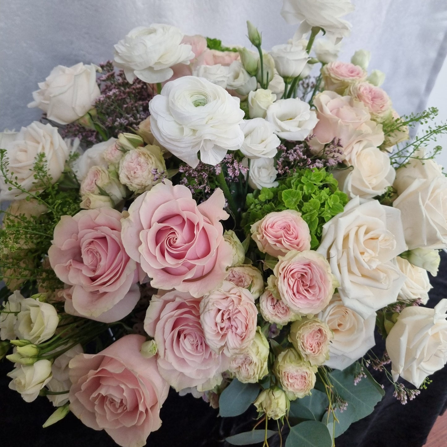 Ivory Meadow Floral Arrangement in Glass Vase